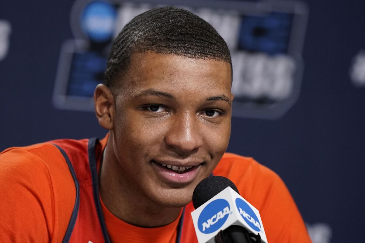 Auburn's Jabari Smith (10) speaks during a news conference on Saturday, March 19, 2022, in Greenville, S.C. Auburn will face Miami in a second-round game of the NCAA college basketball tournament on Sunday. (AP Photo/Brynn Anderson)