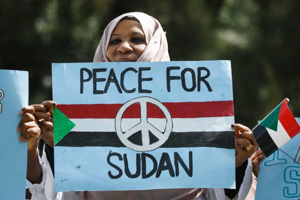 A Sudanese woman joins a protest in Nairobi, Kenya, on June 19, 2019, against Sudan's crackdown on pro-democracy protesters.