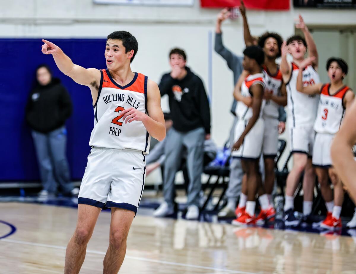 Senior guard Mateo Trujillo of Rolling Hills Prep points to the crowd after making a three-pointer against Oaks Christian.