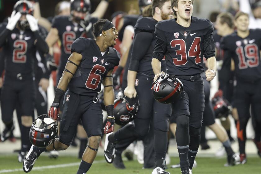 Stanford players celebrate after winning the Pac-12 championship with a victory over USC, 41-22, on Saturday at Levi's Stadium.