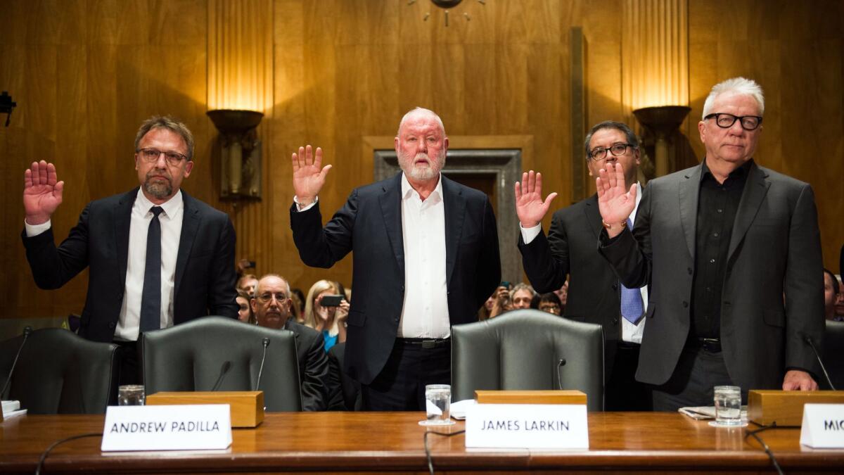Former and current Backpage.com officials are sworn in on Capitol Hill in January. From left are Chief Executive Carl Ferrer, former owner James Larkin, Chief Operating Officer Andrew Padilla and former owner Michael Lacey.
