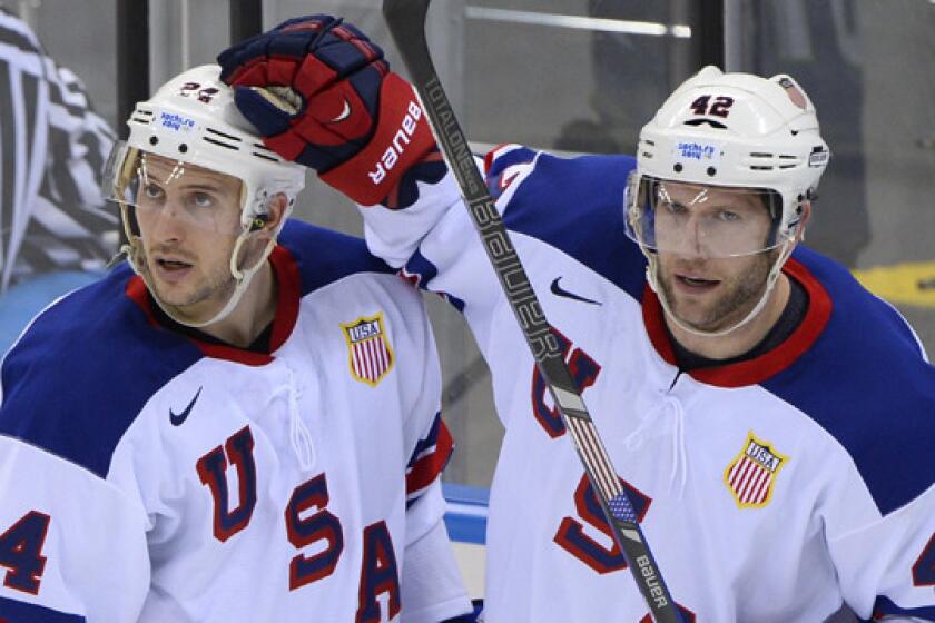 Team USA's David Backes, right, celebrates with teammate Ryan Callahan after scoring during Sunday's win over Slovenia. The United States faces a much tougher test in the quarterfinals Wednesday against Czech Republic.