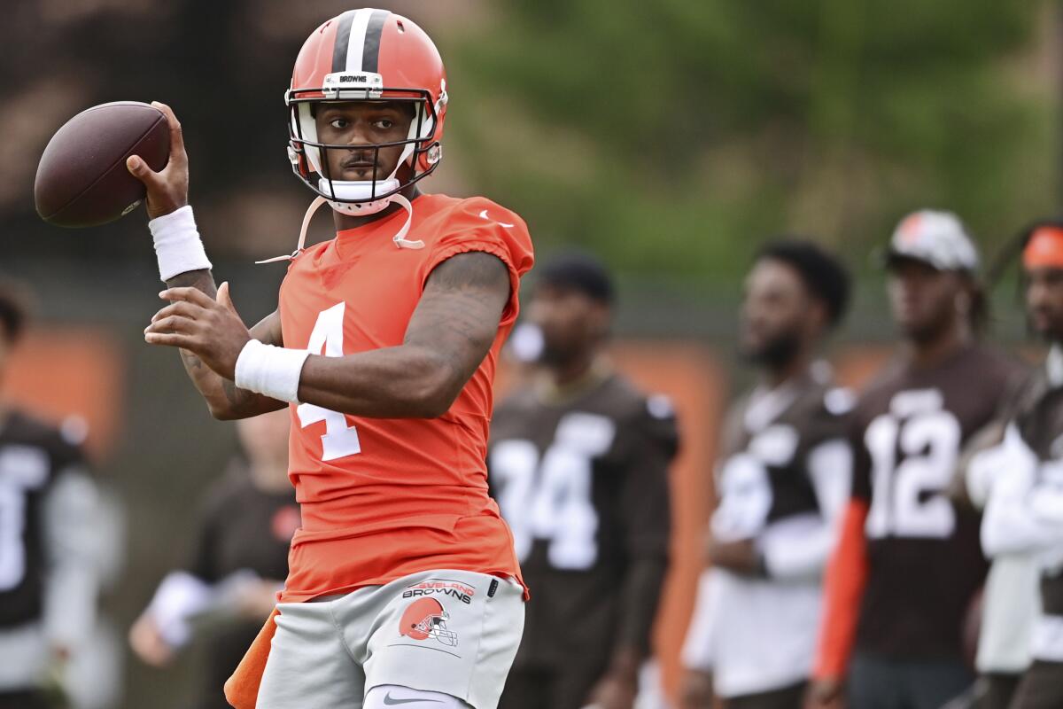 Cleveland Browns quarterback Deshaun Watson throws during NFL football practice in Berea, Ohio.