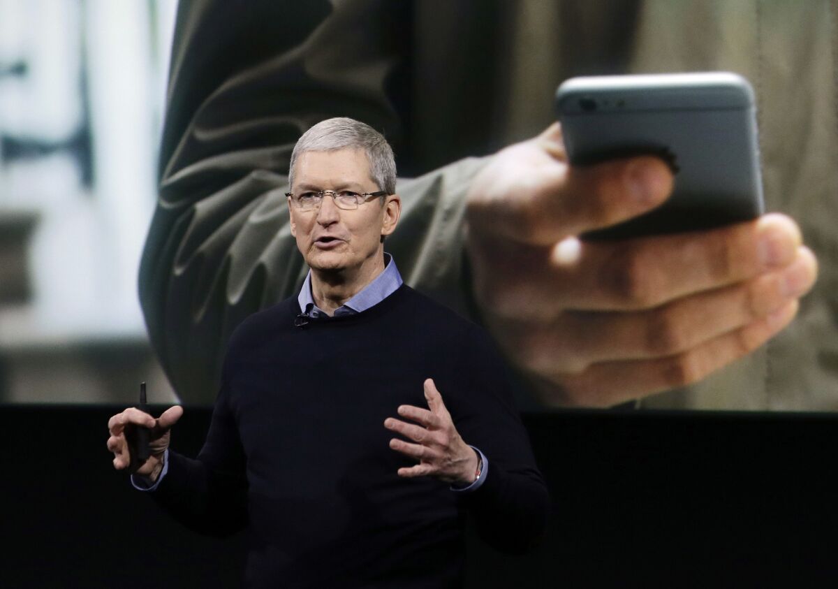 Apple Chief Executive Tim Cook speaks Monday at company headquarters in Cupertino, Calif.