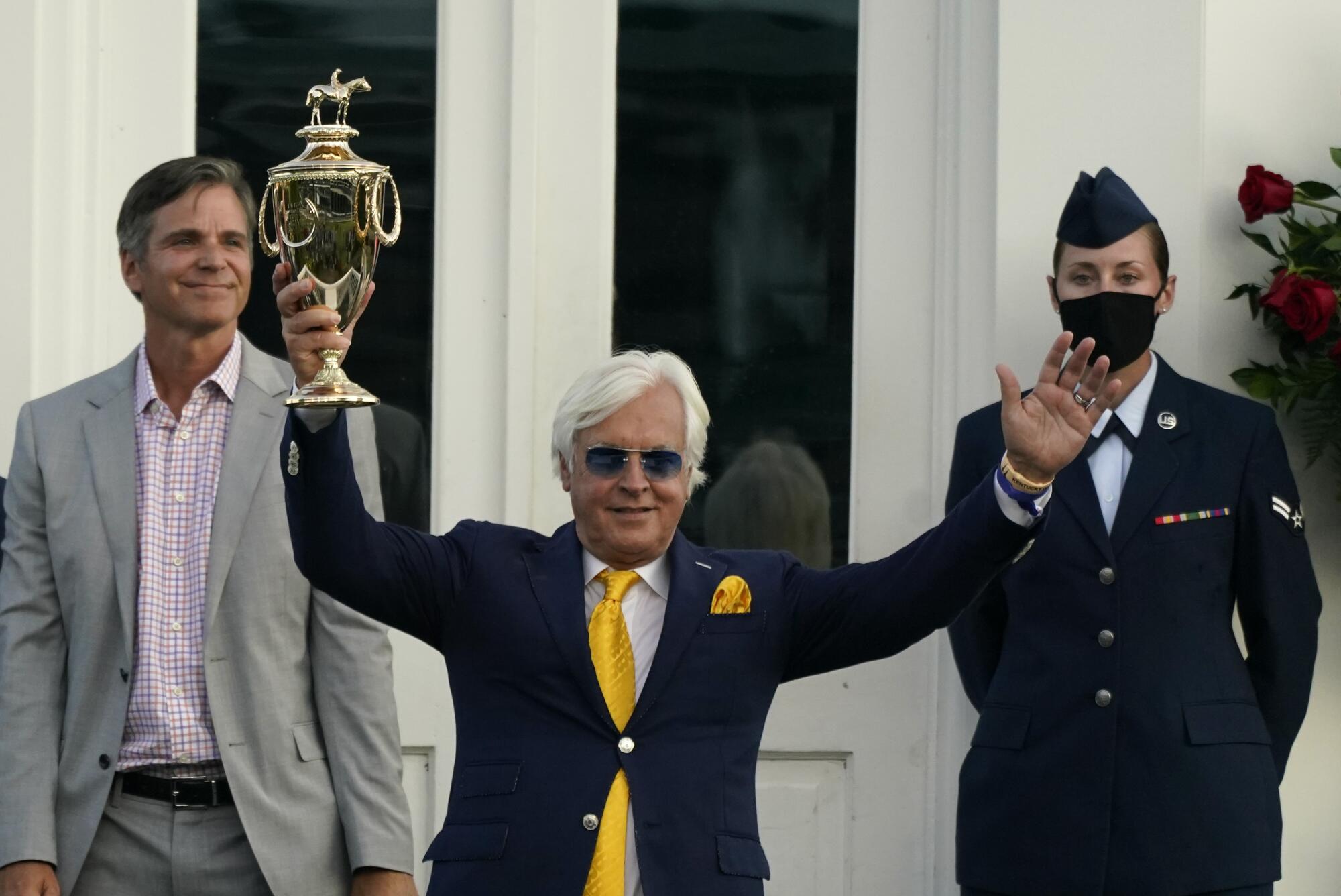 Trainer Bob Baffert celebrates after his horse, Authentic, won the Kentucky Derby in September 2020.