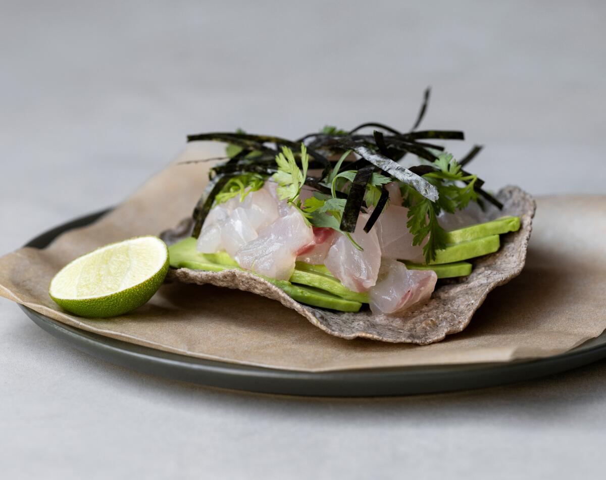Fish tartare with furikake and avocado at Damian.