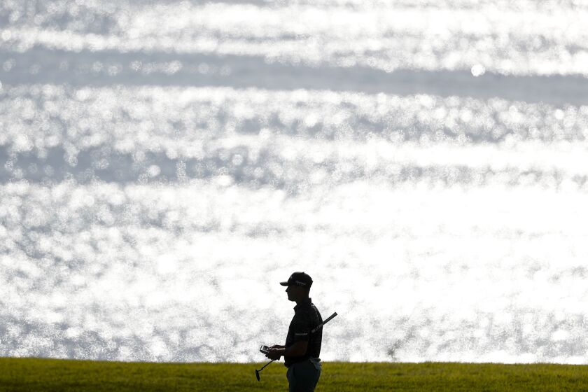 Brent Grant waits before hitting from the fairway of the 15th hole during the first round of the 2023 Farmers Insurance Open