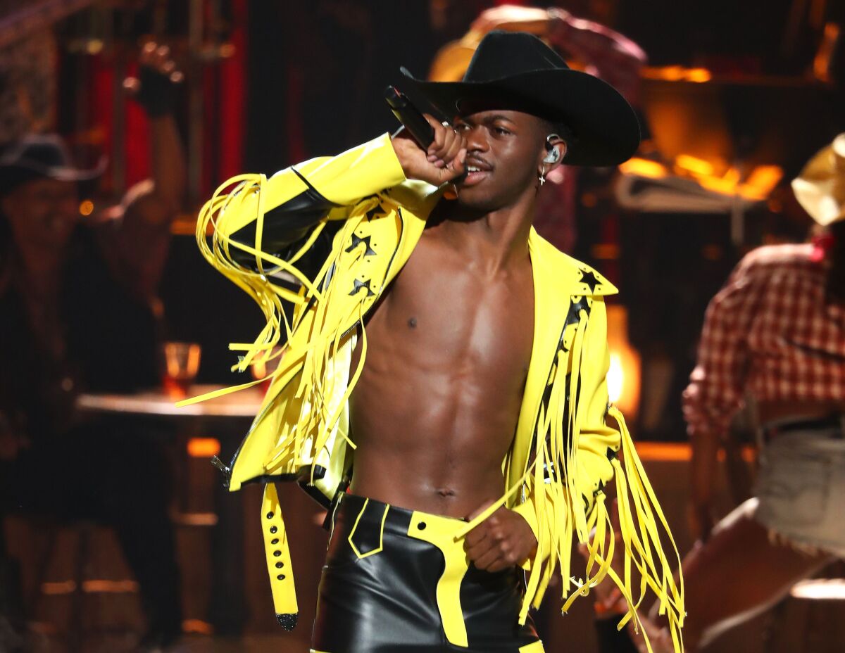 Lil Nas X, who has six Grammy nominations, will perform as part of Sunday's Grammys telecast on CBS. He is shown here during the 2019 BET awards at Microsoft Theater in Los Angeles, California.
