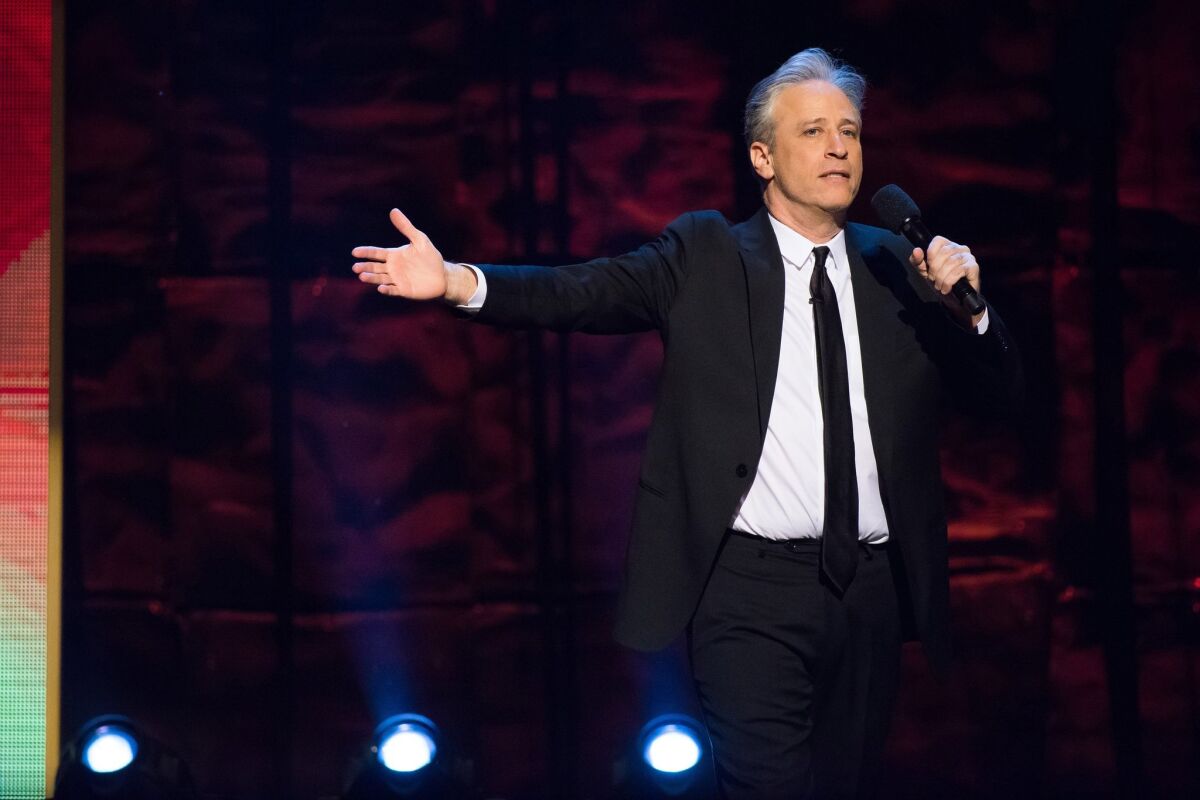 Jon Stewart appears at Comedy Central's "Night of Too Many Stars: America Comes Together for Autism Programs" at the Beacon Theatre in New York on Feb. 28.