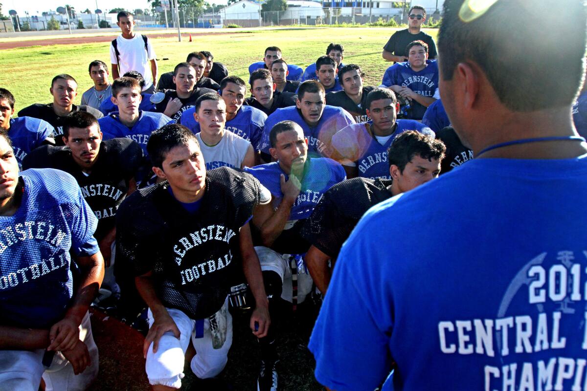 Dragons players give their attention to Matsumoto, 31, who estimates that 60% of the nearly 100 players on his varsity and junior varsity teams are from single-parent families.