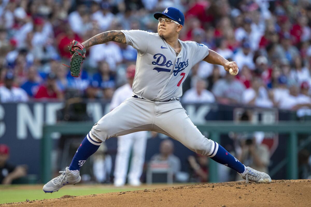 Dodgers starting pitcher Julio Urías delivers during the first inning against the Angels on Saturday.