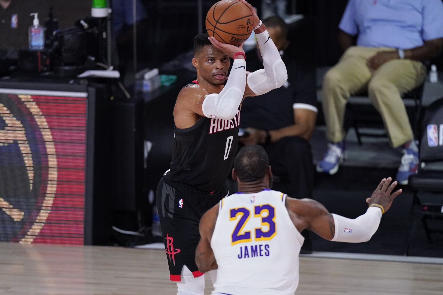 Rockets guard Russell Westbrook attempts a three-point shot against Lakers forward LeBron James during Game 5.