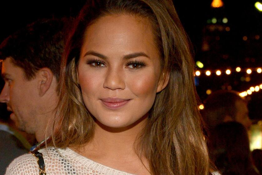 Chrissy Teigen didn't apologize for a Wednesday tweet criticizing U.S. gun laws in the context of the Ottawa shooting, but she did take a Twitter timeout Thursday after being hit with a "sea of hate and anger."