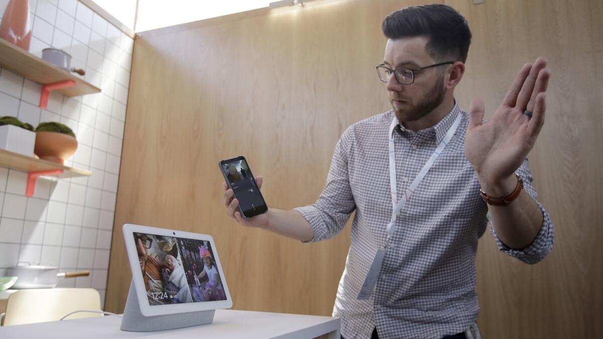 Google's Alexander Hunter gives a demonstration of the Nest Hub Max at the Google I/O conference in Mountain View, Calif., on Tuesday.