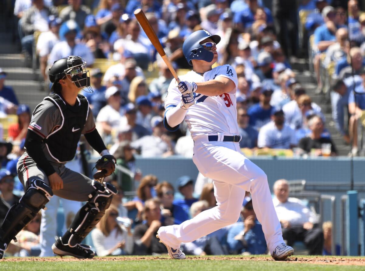 Dodgers left fielder Joc Pederson hits a two-run home run during the second inning of a 12-5 victory over the Arizona Diamondbacks on Thursday.