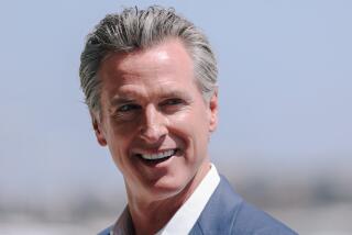 Los Angeles, CA - August 12: Governor Gavin Newsom is seen at a media event for the official Olympic Flag as it returns to Los Angeles for the first time in 40 years via flight LA28 founding partner Delta Air Lines at LAX airport on Monday, Aug. 12, 2024 in Los Angeles, CA. The LA28 Delta flight includes Team USA athletes; LA28, USOPC and Delta executives; and Elected officials. (Dania Maxwell / Los Angeles Times)