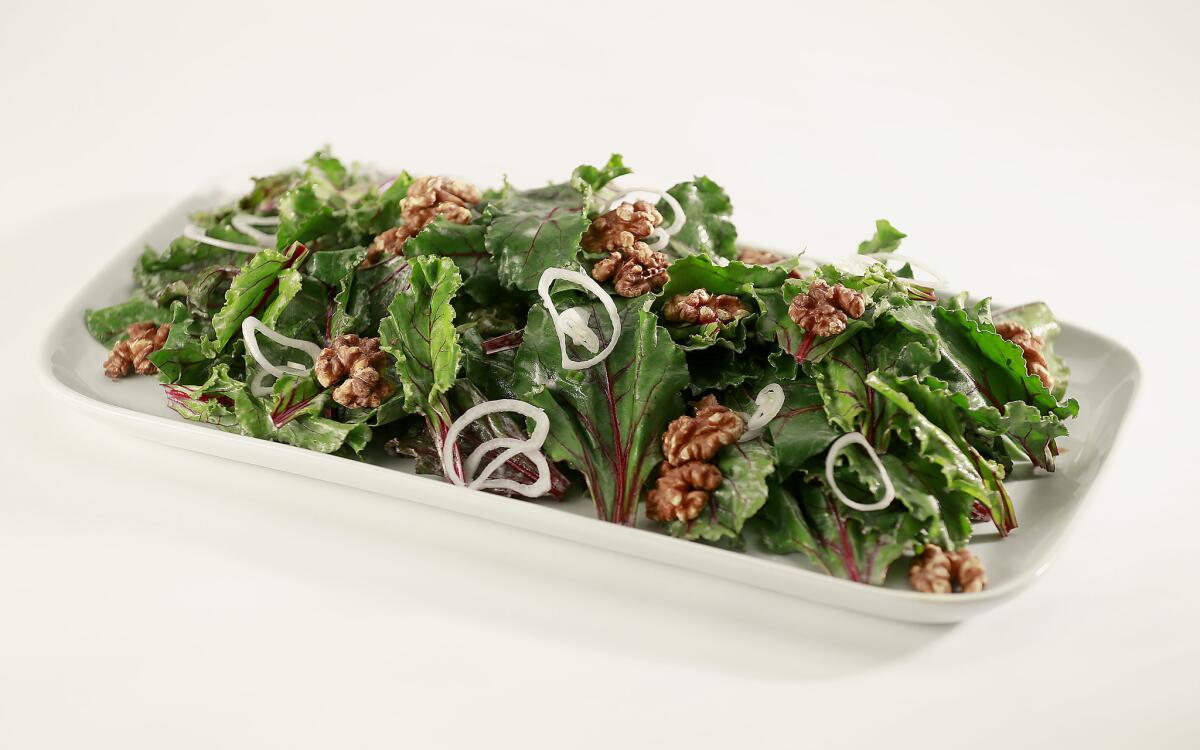 Salad of beet greens with walnuts