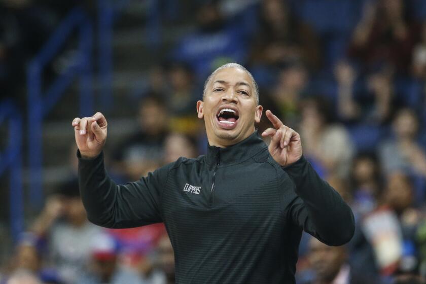 Los Angeles Clippers head coach Tyronn Lue yells during the first half of an NBA preseason basketball game against the Denver Nuggets Wednesday, Oct. 12, 2022, in Ontario, Calif. (AP Photo/Ringo H.W. Chiu)