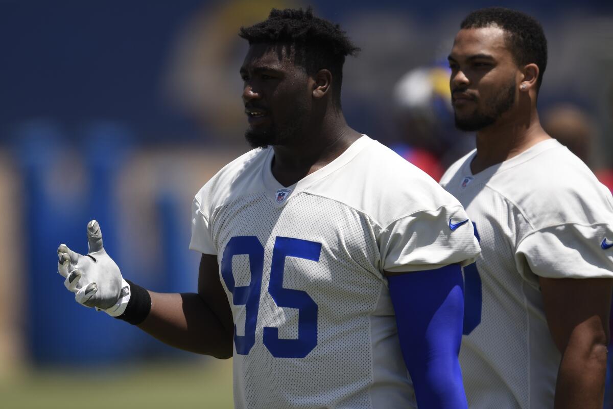 Rams defensive lineman Bobby Brown III walks off the field during a practice.