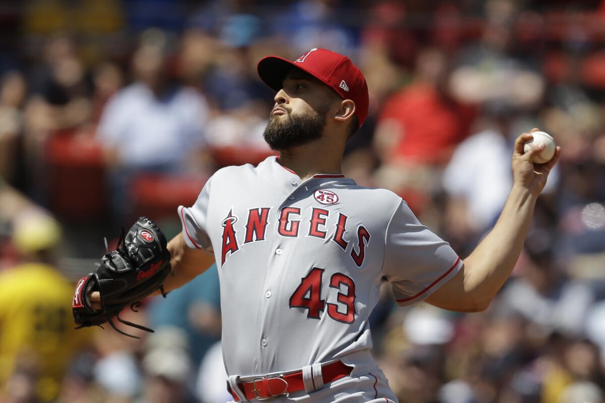 Angels starter Patrick Sandoval delivers against the Boston Red Sox during the first inning of Sunday's game.