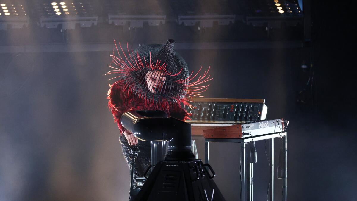 Lady Gaga performs 'Abracadabra' at Grammys with cage around head - Los Angeles Times Lady Gaga performs 'Abracadabra' at Grammys with cage around head - Los Angeles Times