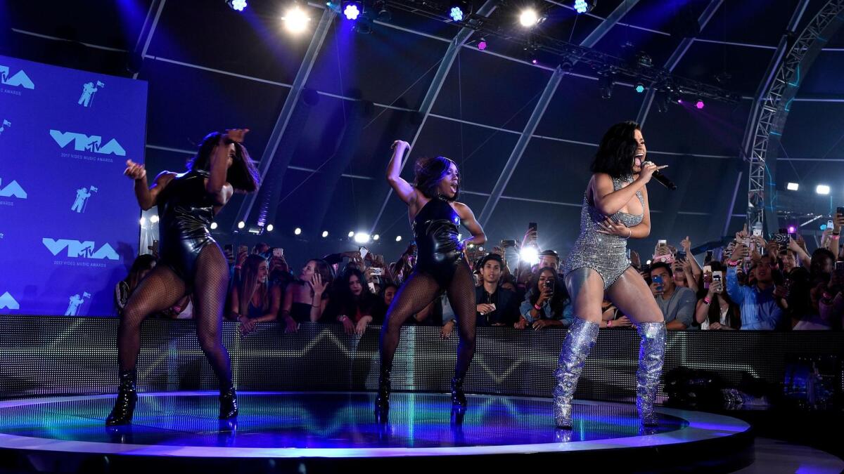 Cardi B performing at the pre-show for the MTV VMAs.