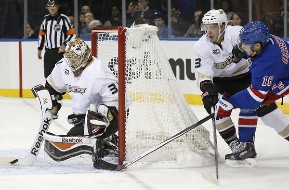 Ducks goalie Frederik Andersen, 31, stops a shot by New York Rangers center Derick Brassard on Nov. 4.