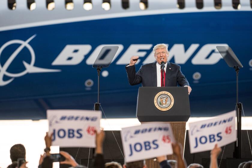 NORTH CHARLESTON, SC - FEBRUARY 17: U.S. President Donald Trump addresses a crowd during the debut event for the Dreamliner 787-10 at Boeing's South Carolina facilities on February 17, 2017 in North Charleston, South Carolina. The airplane begins flight testing later this year and will be delivered to airline customers starting in 2018. (Photo by Sean Rayford/Getty Images) ** OUTS - ELSENT, FPG, CM - OUTS * NM, PH, VA if sourced by CT, LA or MoD **