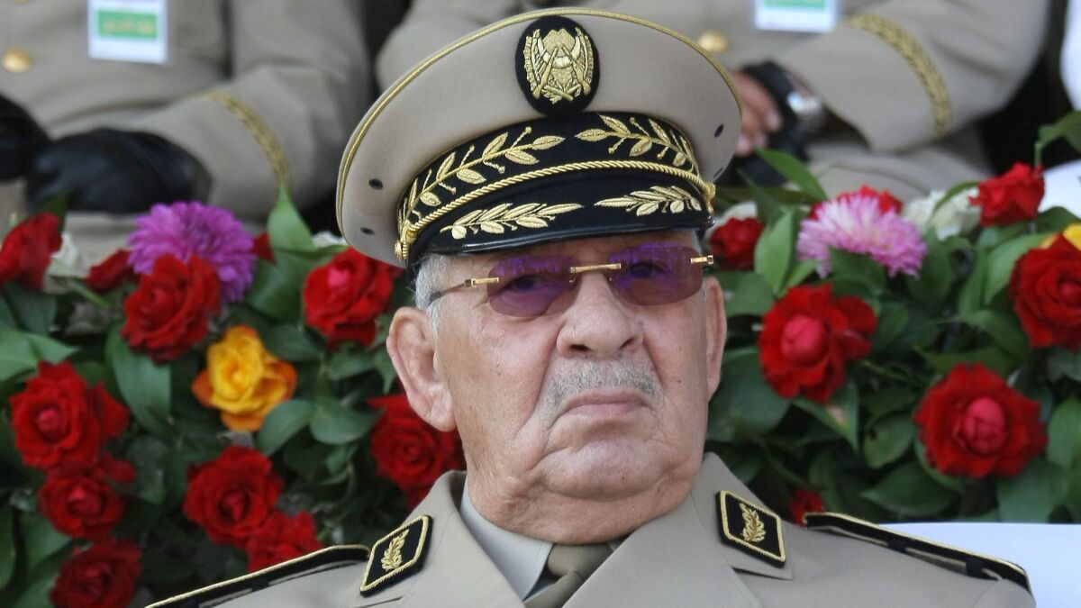 In this July 1, 2018, photo, Algerian chief of staff Gen. Ahmed Gaid Salah presides over a military parade in Algiers, Algeria.