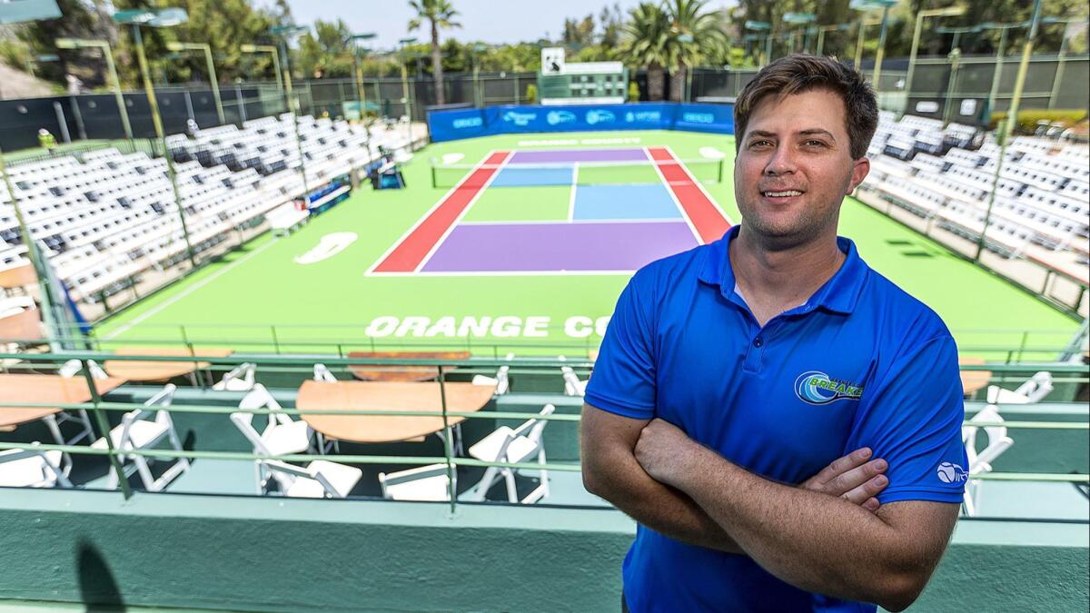 Orange County Breakers General Manager Allen Hardison shows off the pro tennis team's home venue, the Palisades Tennis Club in Newport Beach.