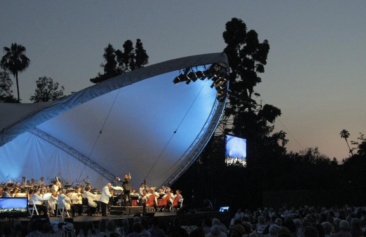 The Pasadena Pops plays in June at the Los Angeles County Arboretum, the first of the concerts conducted by Michael Feinstein.