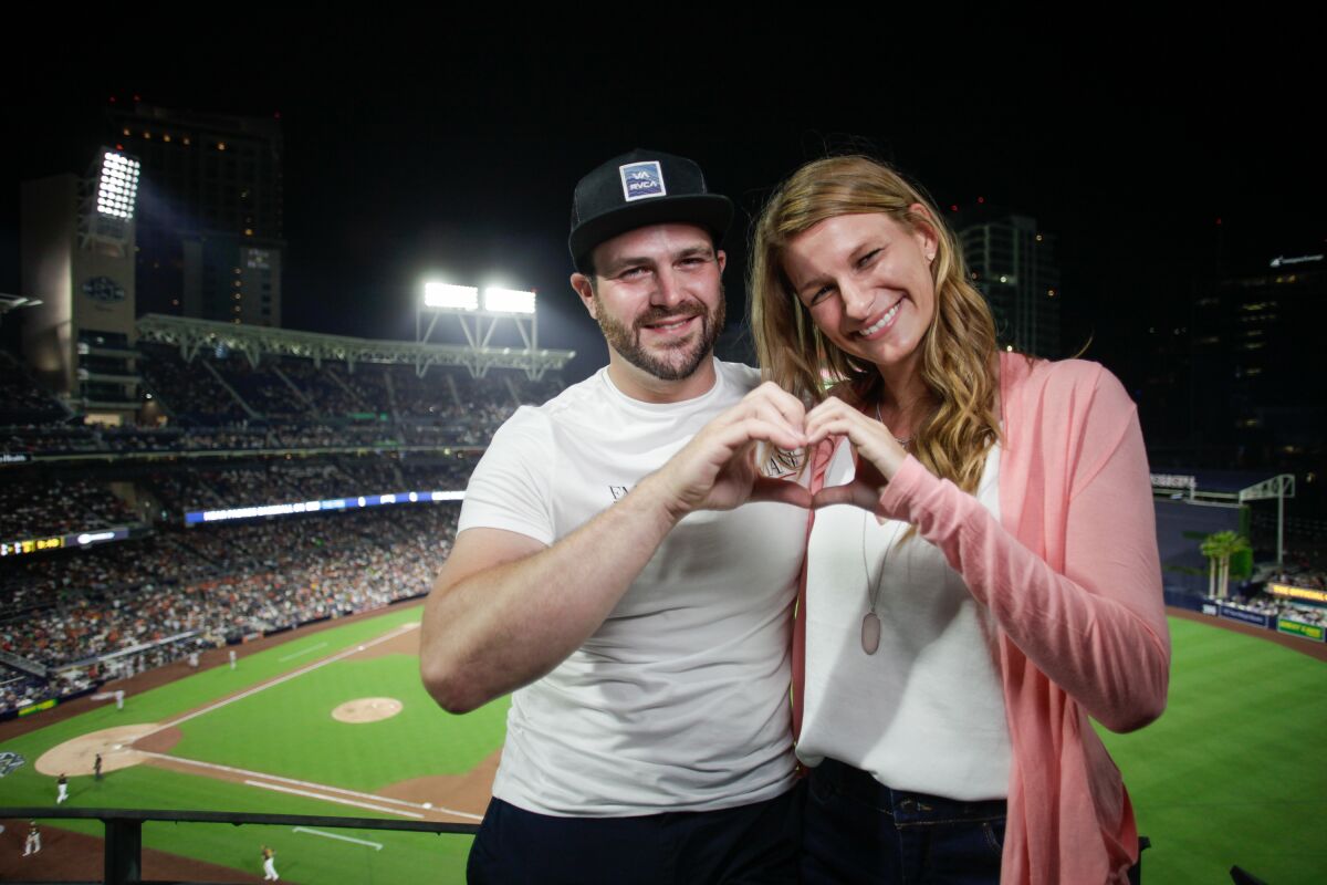 A photo of September blind daters Tom and Kristle on a blind date at Petco Park. 