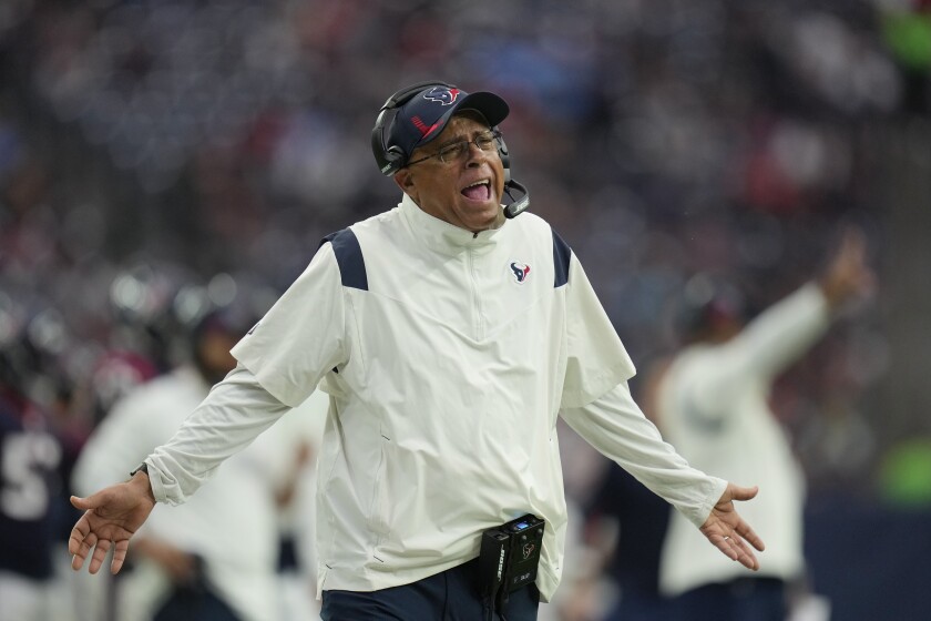 Houston Texans head coach David Culley questions a call during the first half of an NFL football game against the Tennessee Titans, Sunday, Jan. 9, 2022, in Houston. (AP Photo/Eric Christian Smith)