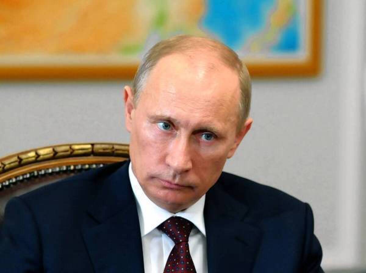 Russian President Vladimir Putin chairs a meeting at his residence outside Moscow. Three new measures that would put limits on the news media, Internet companies and nongovernmental organizations still require approval of the upper house of parliament and Putin, but both moves are expected by the end of the month.