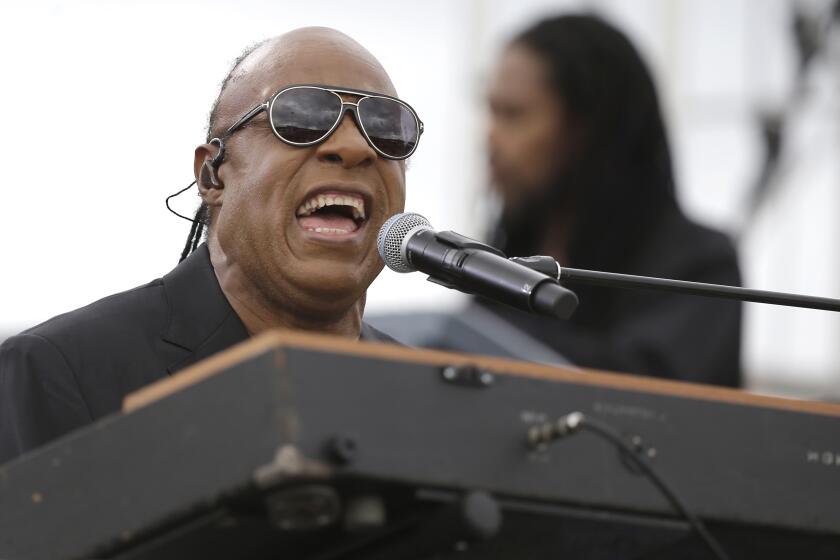 FILE - In this Sunday, Nov. 6, 2016 file photo, Musician Stevie Wonder performs at a campaign rally for Democratic presidential candidate Hillary Clinton before President Barack Obama spoke to the audience in Kissimmee, Fla. Stevie Wonder will headline Global Citizen Live’s star-studded 24-hour event in Los Angeles this month to help raise money and make a plea for increased COVID-19 vaccine doses along with bringing awareness toward climate change and poverty. Global Citizen officials announced Thursday, Sept. 9, 2021 that Wonder will be among several performers – including H.E.R., Adam Lambart and Demi Lovato – to take part in the event at The Greek Theatre on Sept. 25. (AP Photo/John Raoux, File)
