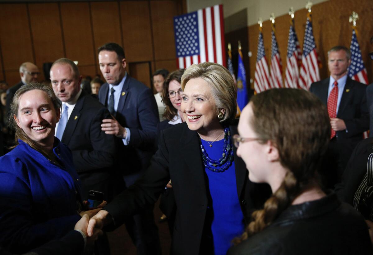 Democratic presidential candidate Hillary Clinton shakes hands after delivering a speech at the University of Wisconsin in Madison on March 28, 2016.