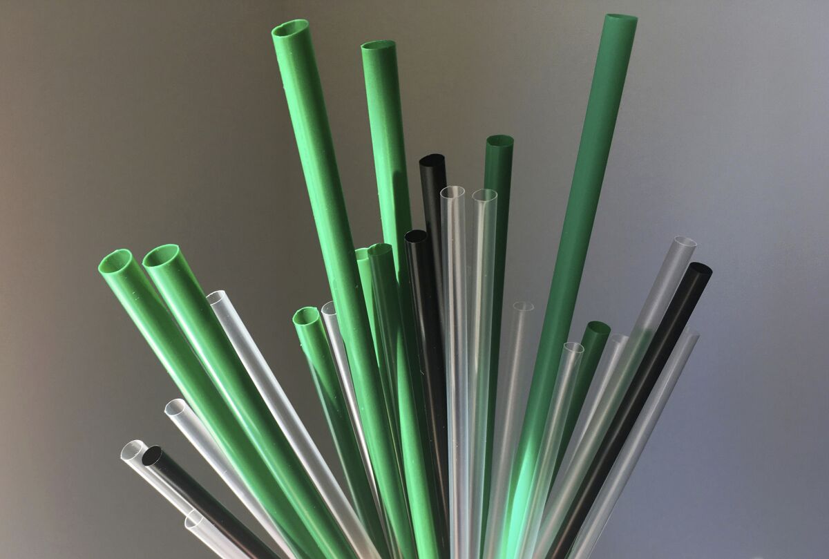 FILE - This May 23, 2018 file photo shows plastic drinking straws in New York. A ban on plastic straws, stirrers and cotton buds came into force in England on Thursday Oct. 1, 2020, after a six-month delay caused by the coronavirus pandemic. (AP Photo/Barbara Woike, File)
