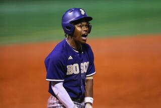 Noah Everly of St. John Bosco gets excited after his RBI triple in the 10th inning broke 1-1 tie.