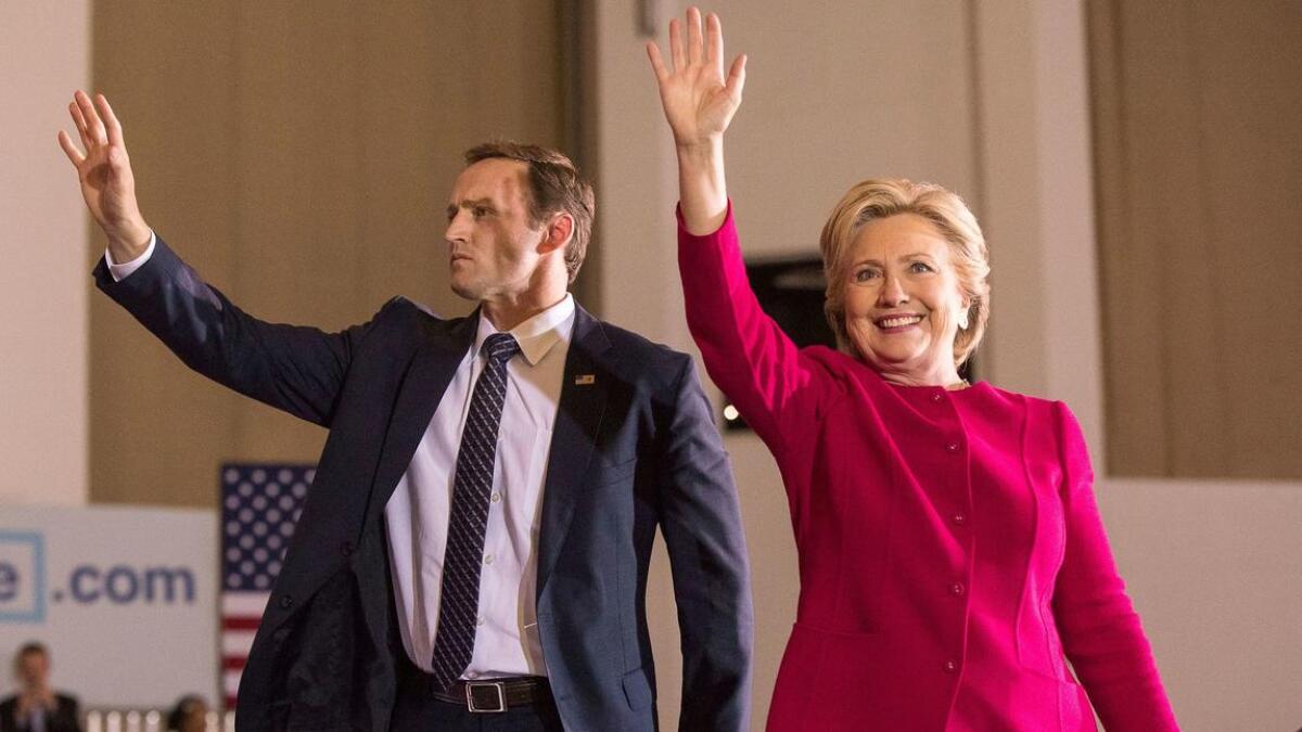 Hillary Clinton and Rep. Patrick Murphy, who is running to unseat Florida Sen. Marco Rubio.