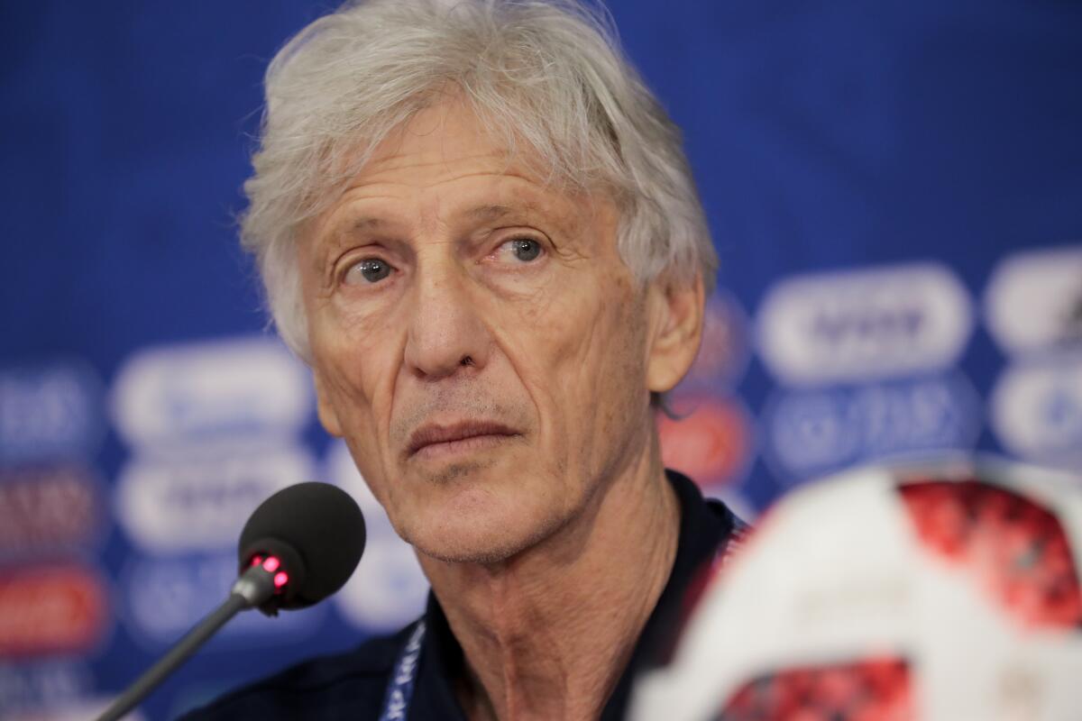 FILE - Colombia head coach Jose Pekerman listens to a question during a news conference at the World Cup in Moscow, Russia, July 2, 2018. Pekerman was named as Venezuela's new coach on Tuesday, Nov. 30, 2021. (AP Photo/Alexander Zemlianichenko, File)