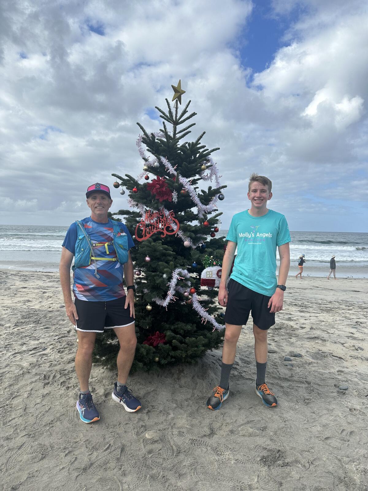 Kevin Hopp with former student Jake Thompson, a San Dieguito Academy freshman.