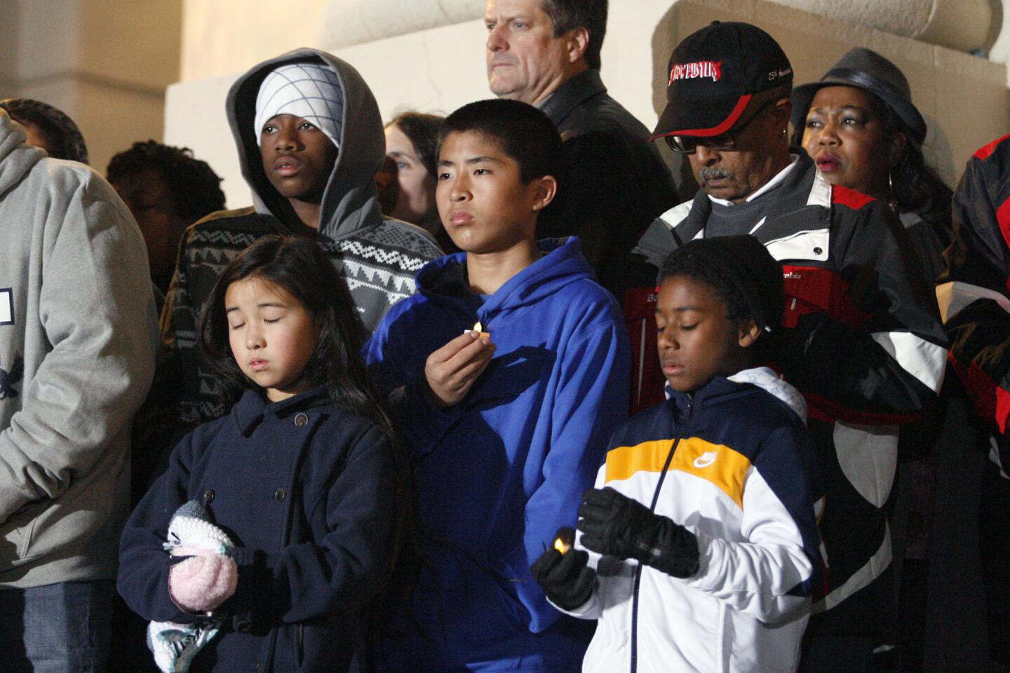 Family and friends gather for Victor McClinton's vigil at Pasadena City Hall