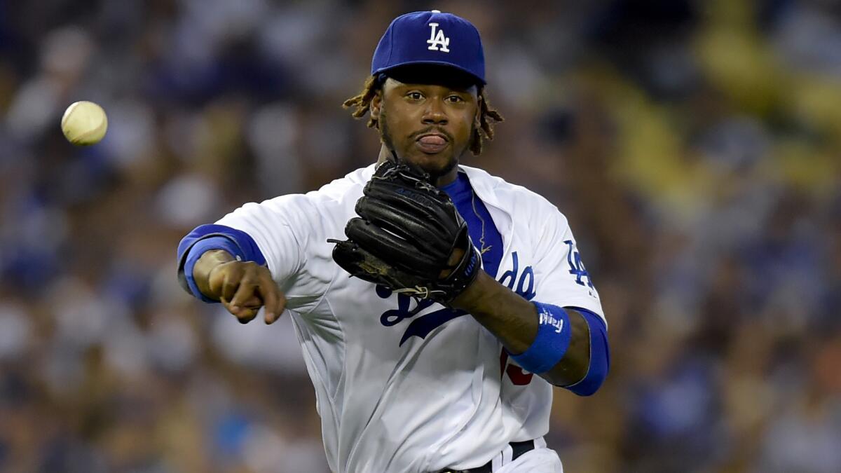 Dodgers shortstop Hanley Ramirez makes a throw during a Sept. 1 game against the Washington Nationals. Ramirez had two errors in the second inning of a 6-3 loss to the San Diego Padres on Tuesday. ** Usable by LA, DC, CGT and CCT Only **