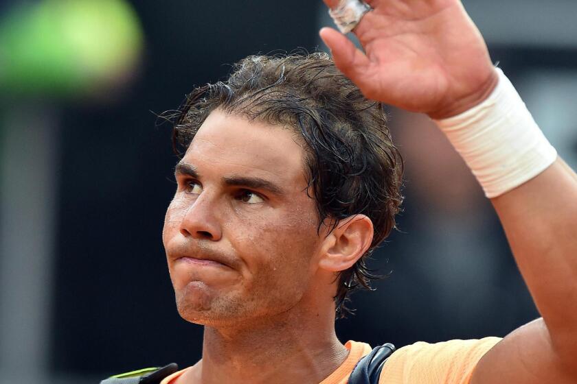 Rafael Nadal waves after losing to Novak Djokovic at in the Italian Open on May 13.