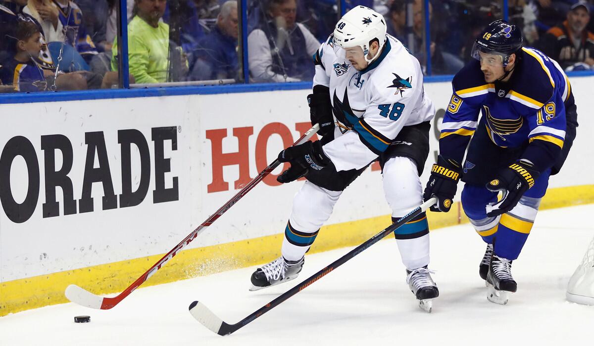 San Jose Sharks' Tomas Hertl, left, skates against St. Louis Blues' Jay Bouwmeester during the second period in Game 2 of the Western Conference Final during the Stanley Cup Playoffs on Tuesday.