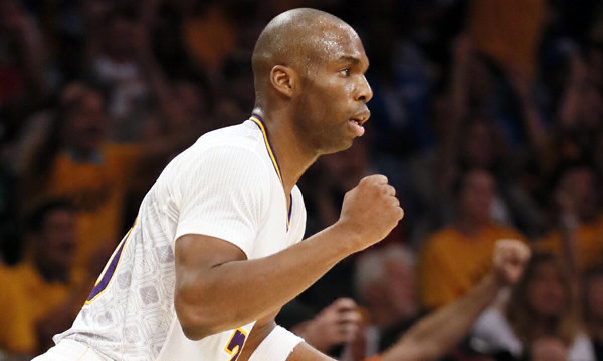Lakers guard Jodie Meeks celebrates a three-pointer made by teammate Kent Bazemore (not pictured) during Sunday's win over the Oklahoma City Thunder. Will Meeks remain on the Lakers' roster next season?