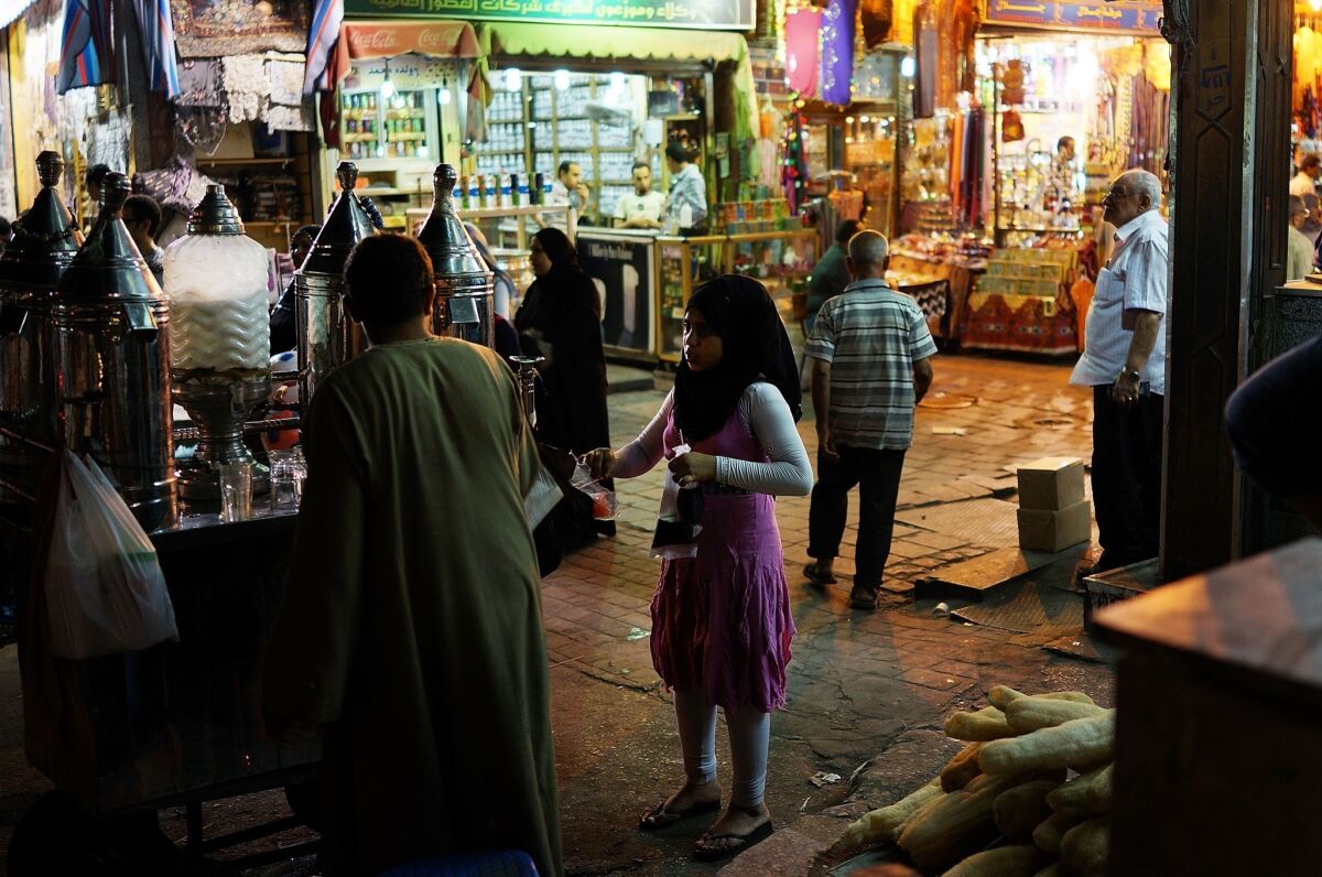 Egyptians shop in a market in Cairo on the eve of Ramadan.