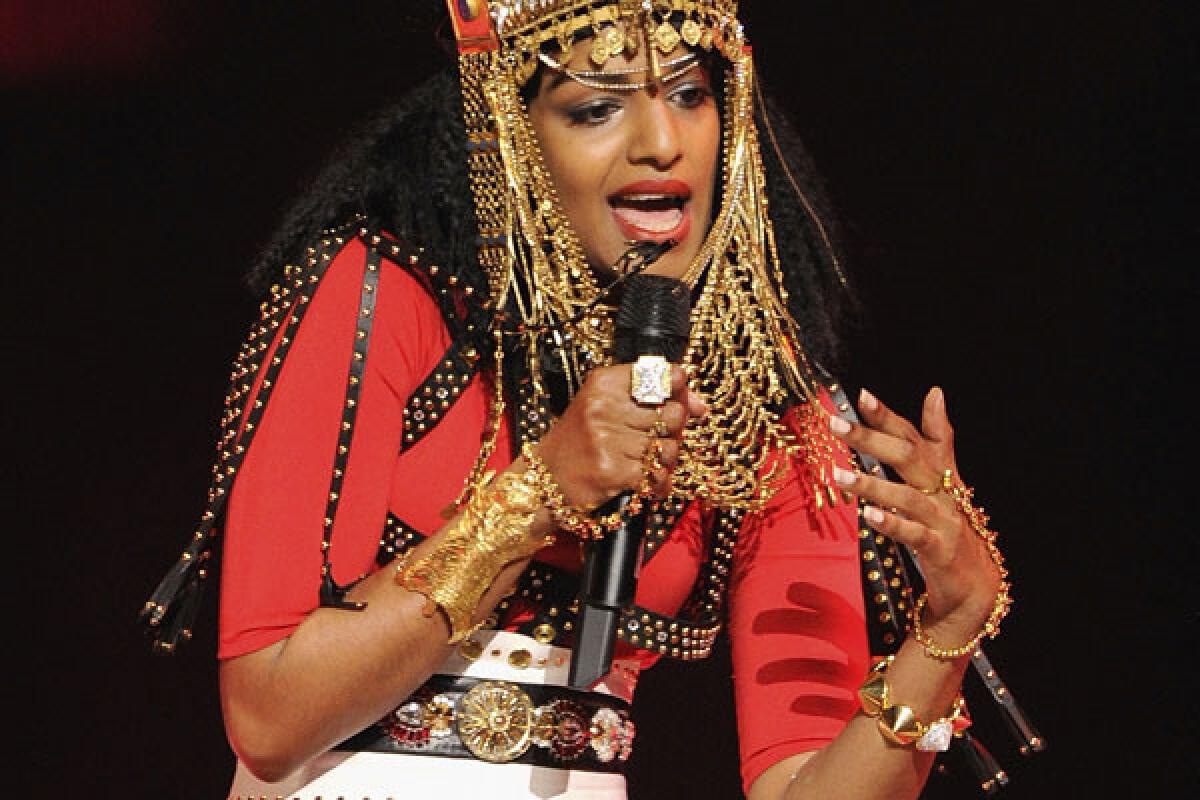 The singer M.I.A. performing at the 2012 Super Bowl.
