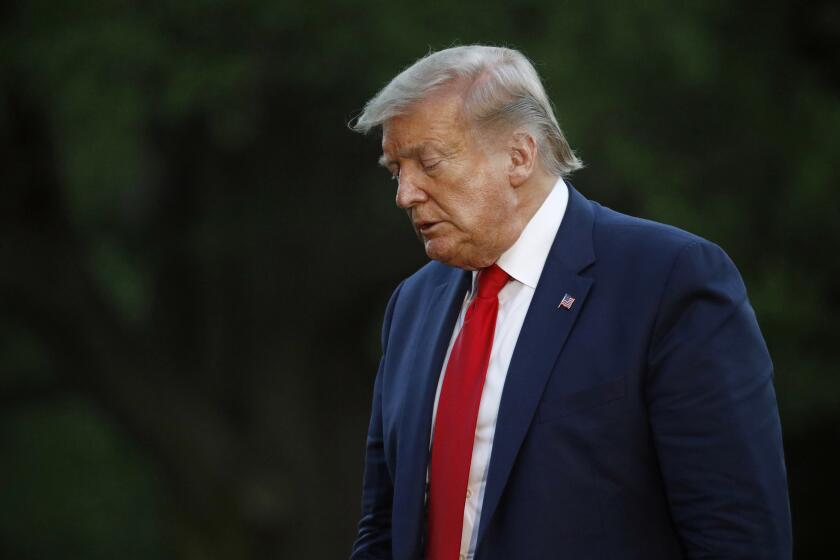 President Donald Trump walks across the South Lawn of the White House in Washington, Saturday, May 30, 2020, after stepping off Marine One as he returns from Kennedy Space Center for the SpaceX Falcon 9 launch. (AP Photo/Patrick Semansky)