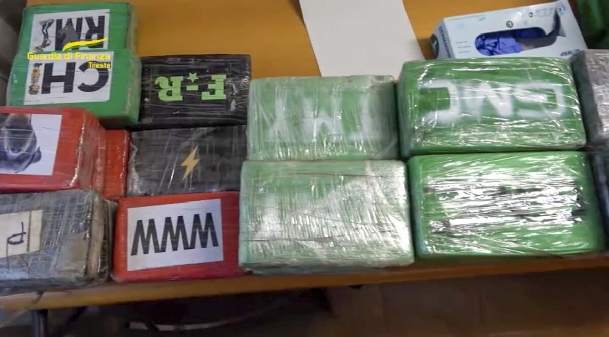 This picture taken from a video released on Tuesday, June 7, 2022, by the Italian Financial Police during a press conference in Trieste, northern Italy, shows piles of seized cocaine as part of an international investigation that has dealt a blow to the feared Colombian Gulf Clan in one of the largest drug busts ever in Europe. (Guardia di Finanza via AP)